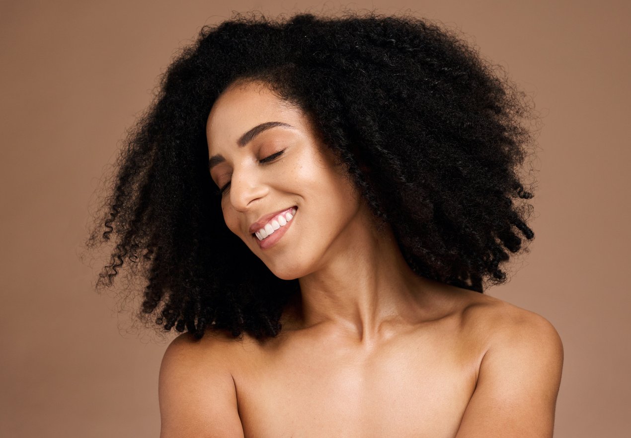 Hair Care, Afro Beauty and Face of Black Woman with Clean Shampoo Hair, Healthy Hair Growth and Happy with Spa Salon Treatment. Wellness, Trichology and Model with Skincare Glow, Makeup and Cosmetics